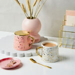 Gold Speckled White Mug With Spoon And Lid Martha Brook